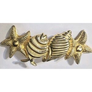 DOTTY SMITH SEASHELLS BELT BUCKLE GOLD COLOR STARFISH SHELLS VINTAGE